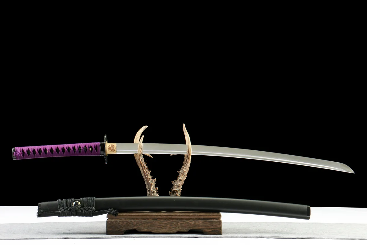 Tranchant de l'Abîsse - Katana Forge a la Main en Acier Damas trempe a l'argile